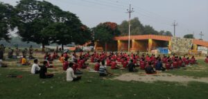Nishant Sir teaching yoga at the Sangam Area.